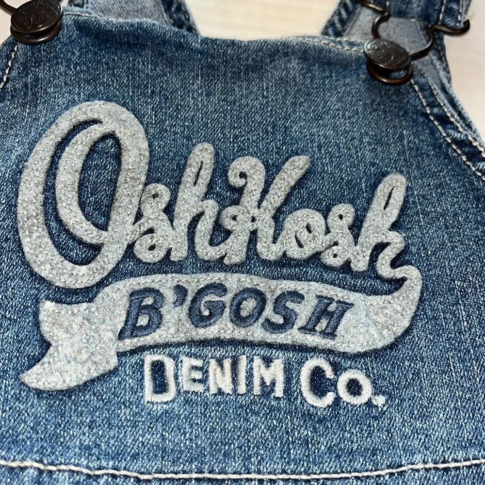 OshKosh B'gosh vestbak-2T- embroidered logo, adj. straps,  Blue denim, Overalls.